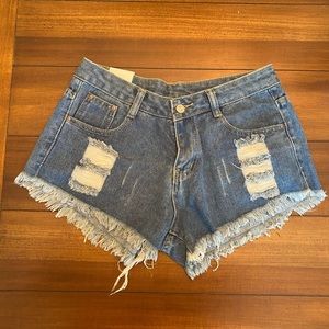 Mid-Rise Distressed Medium Wash Jean Shorts
